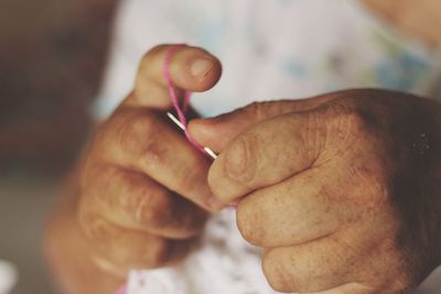 Close-up of hand knitting wool