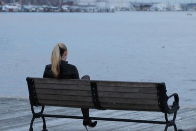 Woman sitting in water