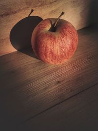 High angle view of apple on table