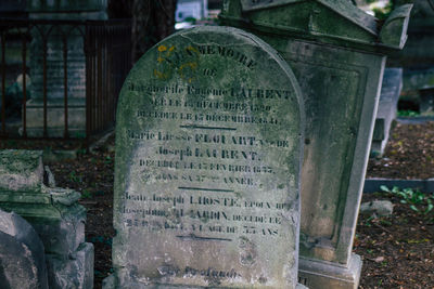 Text on stone at cemetery