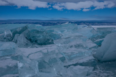 Aerial view of frozen sea against sky