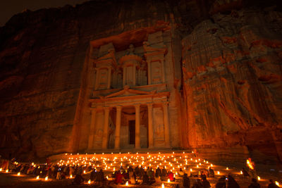 Group of people in illuminated building