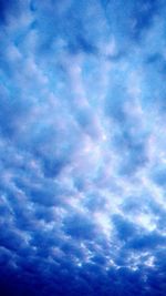 Low angle view of clouds in blue sky