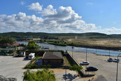 High angle view of road by sea against sky