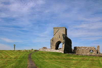 View of old ruins against sky at devenish island