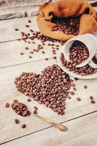 High angle view of roasted coffee beans on table