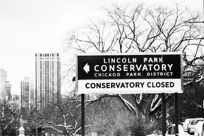 Information sign on road in city