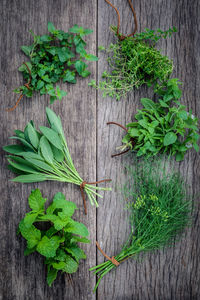 Directly above shot of vegetables and herbs on table