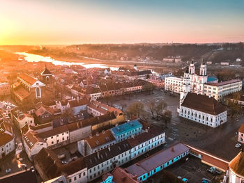 High angle view of buildings against sky during sunset