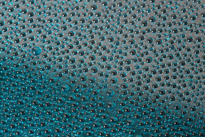 Full frame shot of water drops on glass