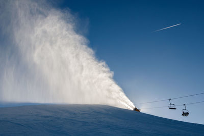 Low angle view of vapor trail against sky