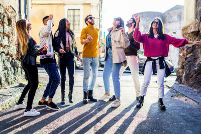 Group of people walking on road