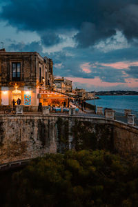 Panoramic view of ortigia with fonte aretusa and lungomare alfeo  during sunset