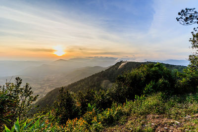 Scenic view of landscape against sky during sunset