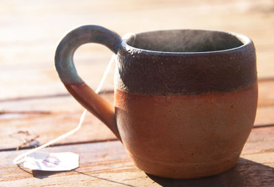 Close-up of tea cup on table