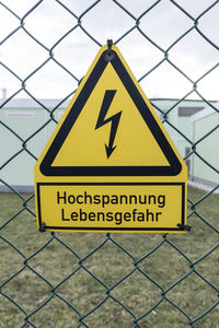 Information sign on chainlink fence