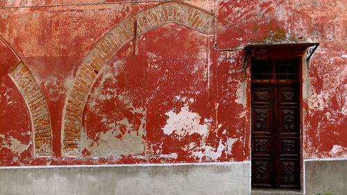 Brick wall with closed door