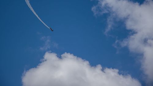 Low angle view of airplane flying