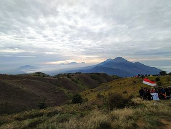 Scenic view of landscape against sky during sunset