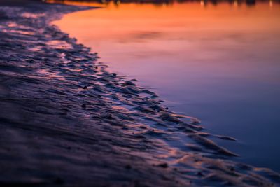 Scenic view of sea against sky at sunset