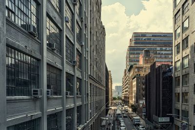 Street amidst buildings against sky