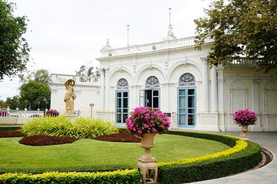 The principal entrance to the inner palace against flowering garden