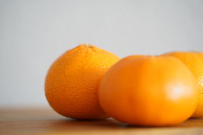 Close-up of orange fruits on table
