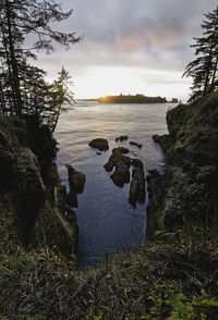 Scenic view of lake against sky during sunset