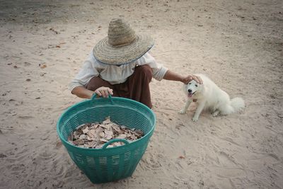 Midsection of woman wearing hat