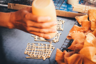 High angle view of man working on table