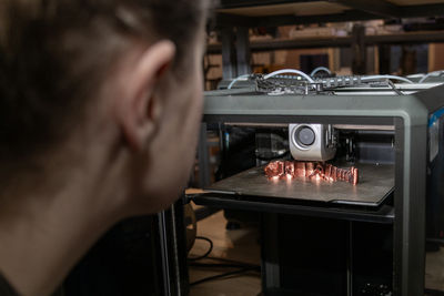 Close-up of man using mobile phone