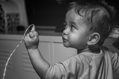 Close-up of boy looking away