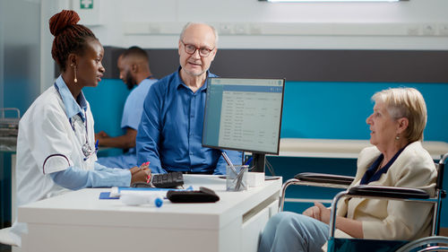 Female doctor working at clinic