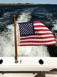 Red flag on boat in sea