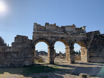 View of ancient ruins against mountain in pamukkale turkey