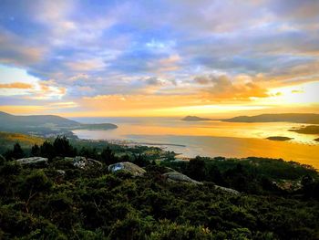 Scenic view of landscape against sky during sunset