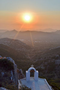 Scenic view of mountains against sky during sunset