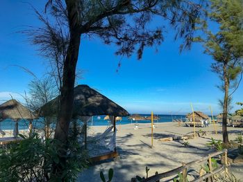 Scenic view of sea against blue sky