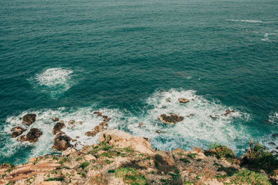 High angle view of rocks on beach