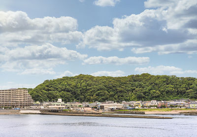 Dike of the port of kurihama district in the yokosuka city in front of the beach of miura peninsula.
