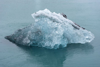 Floating icebergs in jokulsarlon glacial lagoon, iceland