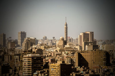 Modern buildings in city against sky