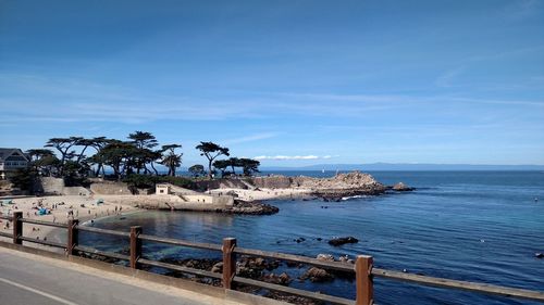 Scenic view of sea against blue sky