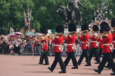 Military parade on street in city