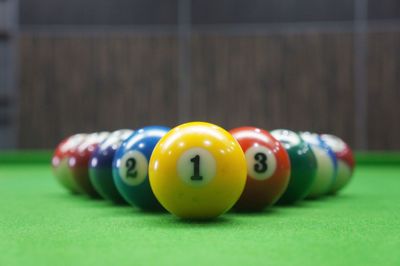 Close-up of multi colored balls on table