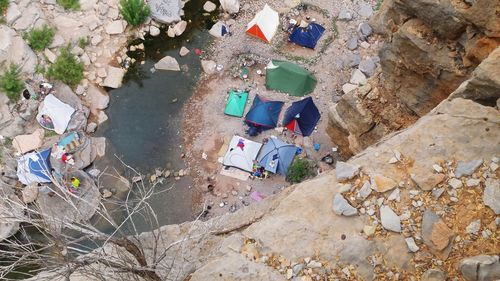 High angle view of garbage on rock
