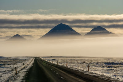 Panoramic view of road against cloudy sky