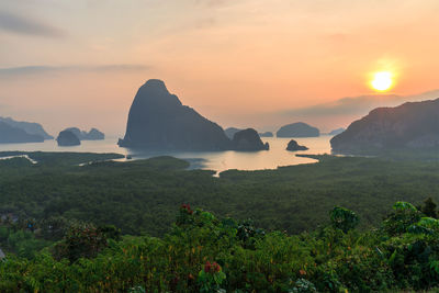 Scenic view of mountains against sky during sunset