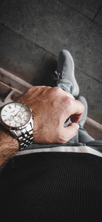 High angle view of man hand on the floor