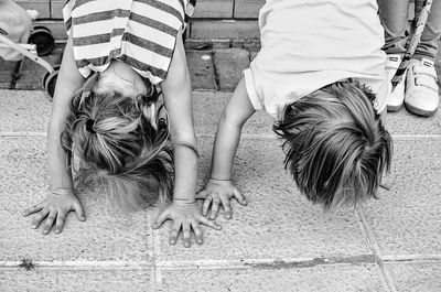 Low section of woman with dog